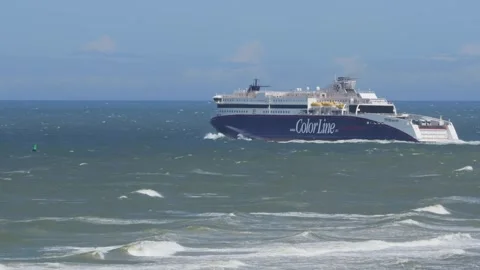 Hirthals, Denmark - July 06, 2026: Large color line ferry sailing on wavy sea Stock Footage 338329748