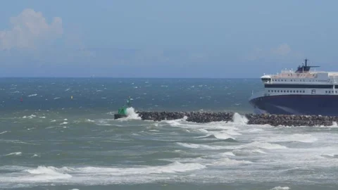 Hirthals, Denmark - July 06, 2026: Color Line ferry in rough seas at harbor Stock Footage 338329776