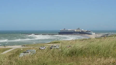 Hirthals, Denmark - July 06, 2026: Color line ferry ship maneuvering into harbor Stock-Footage 338339101