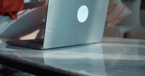At his desk man opens his laptop and wears glasses signaling start of day. Start Stock Footage 259897727