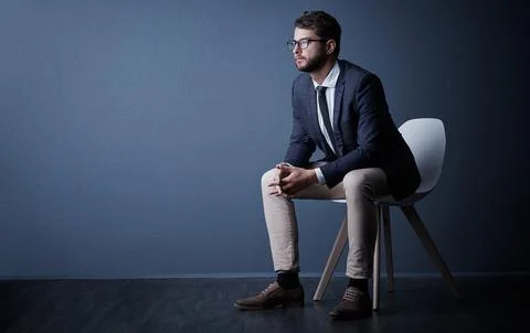 His future is bright. Studio shot of a handsome young businessman looking Stock Photos