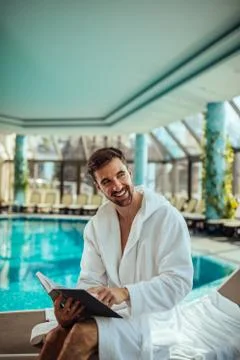 His poolside entertainment Stock Photos