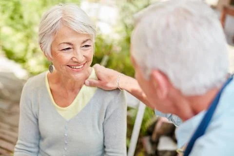 His support means more than hell ever know. Shot of a happy senior couple Stock Photos