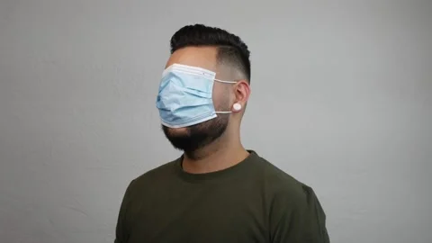 Hispanic Bearded Man Uses Face Mask Incorrectly Stock Footage 173347004