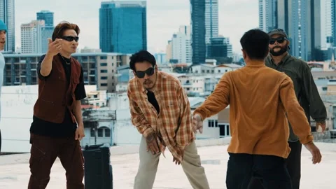 Hispanic break dancer practice B boy dance with friends at roof top. hiphop. Stock Footage 264501248
