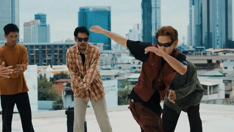Hispanic break dancer practice B boy dance with friends at roof top. hiphop. Stock Footage 266845842