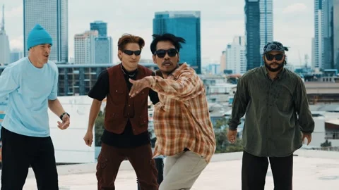Hispanic break dancer practice B boy dance with friends at roof top. hiphop. Stock Footage 267768158