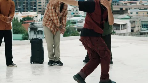 Hispanic break dancer practice B boy dance with friends at roof top. hiphop. Stock Footage 269306569