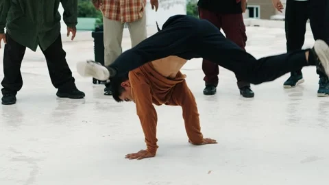 Hispanic break dancer practice B boy dance with friends at roof top. hiphop. Stock Footage 269710621