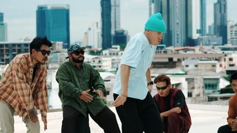 Hispanic break dancer practice B boy dance with friends at roof top. hiphop. Stock-Footage 277119918
