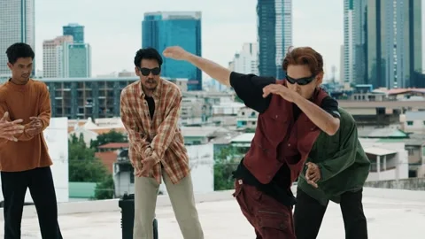 Hispanic break dancer practice B boy dance with friends at roof top. hiphop. Stock-Footage 277129215