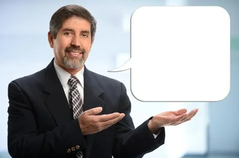 Hispanic Businessman With Bubble Text Stock Photos