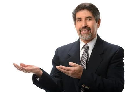 Hispanic businessman gesturing Stock Photos