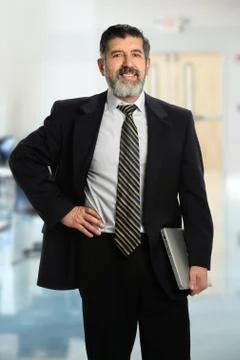 Hispanic Businessman with Laptop Stock Photos