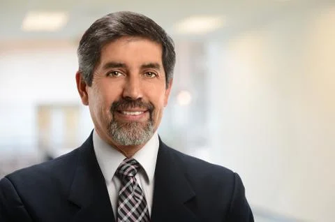 Hispanic businessman smiling Stock Photos