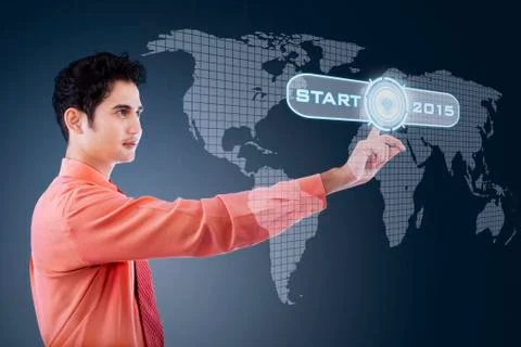 Hispanic businessman touching a start button Stock Illustration