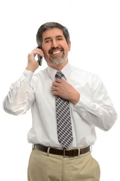 Hispanic businessman using cellphone Stock Photos