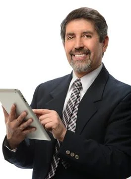 Hispanic businessman using electronic tablet Stock Photos