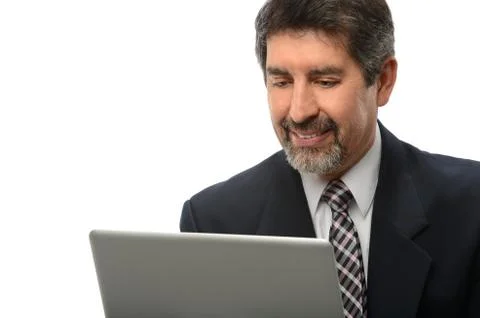 Hispanic businessman using laptop Stock Photos