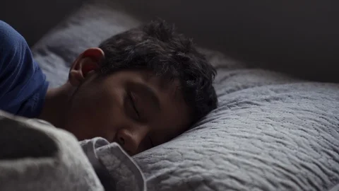 Hispanic Child Sleeping in Bed And Waking Up Early Morning 動画素材 128911733