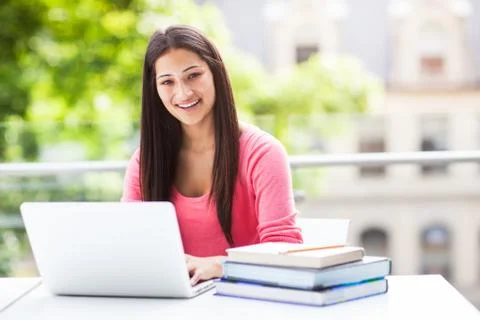 Hispanic college student with laptop Stock Photos