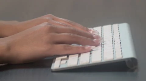 Hispanic College Student Types on Keyboard Stock Footage 56347008