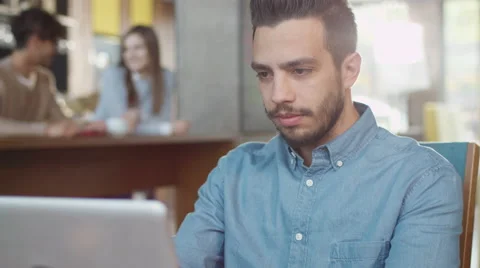 Hispanic Ethnicity Young Man using Laptop Computer at Cozy Coffee Shop. Stock Footage 68201613