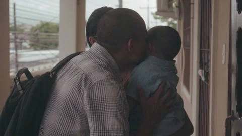 Hispanic father returning home from work Video stock 341892806