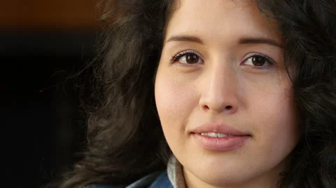 Hispanic female face turning to camera Stock Footage 48519721