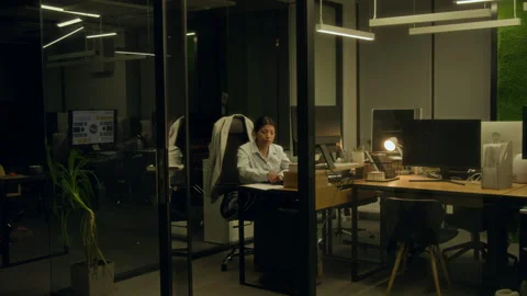 Hispanic Female Manager Falling Asleep while Working on Project at Night Stock Footage 331860140