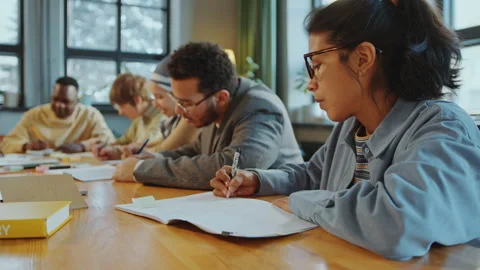 Hispanic Female Student Taking Notes during Foreign Language Class Stock Footage 274626620
