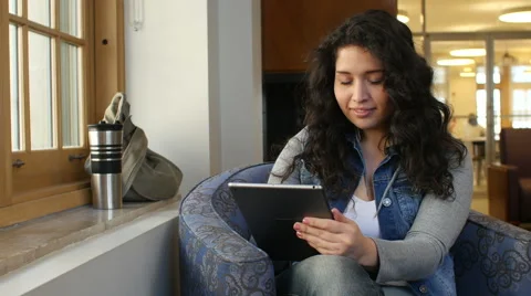 Hispanic female with tablet 動画素材 48511761