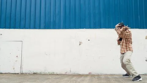 Hispanic funny choreographer dancing in hip hop style. Modern dance. Endeavor. 스톡 사진