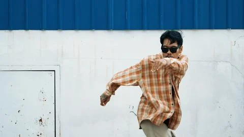 Hispanic funny choreographer dancing in hip hop style. Modern dance. Hiphop. Stock Photos