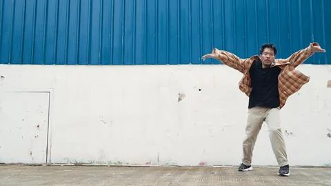 Hispanic funny choreographer dancing in hip hop style. Modern dance. Hiphop. Stock Photos