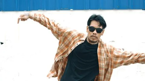 Hispanic funny choreographer dancing in hip hop style. Modern dance. Hiphop. Stock Photos