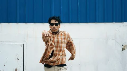 Hispanic funny choreographer dancing in hip hop style. Modern dance. Hiphop. Stock Photos