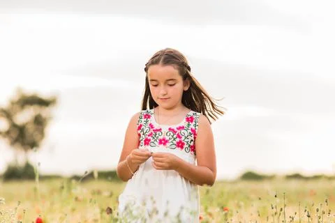 Hispanic girl doing a viral dance for social network mobile smartphone Stock Photos