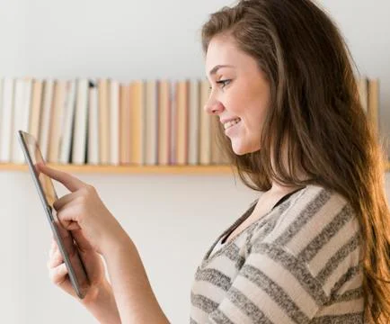 Hispanic girl using tablet computer 스톡 사진
