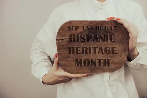 Hispanic Heritage Month date on vintage wooden board Stock Photos