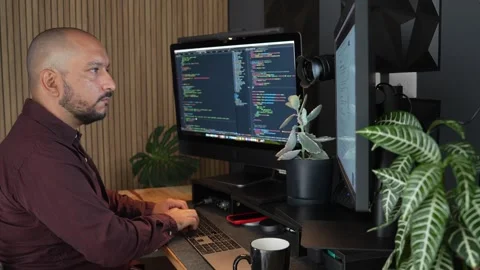 Hispanic IT Engineer Fixing Bug or Problem on Production. Web Developer Stock Footage 281684624
