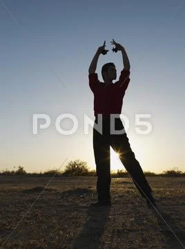 Hispanic male flamenco dancer posing Stock Photos