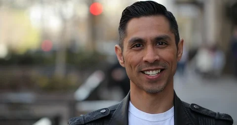Hispanic man in city smile happy face portrait Stock Footage