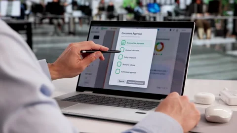 Hispanic Man Using Cloud-Based Software To Review And Approve Documents Stock Footage 332903926