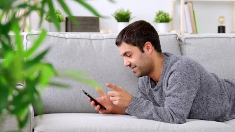 Hispanic man using dating app Stock Footage 260271820