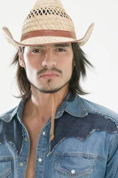 Hispanic man wearing cowboy hat Stock Photos