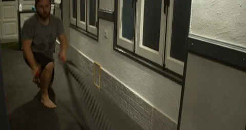 Hispanic man working out with Battle Ropes. Body positive Stock Footage 166534171