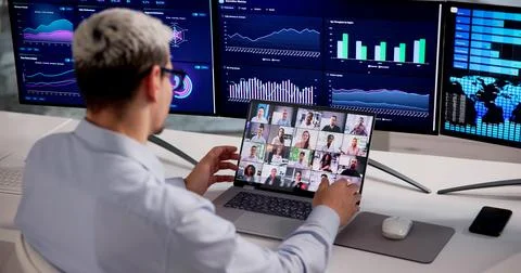 Hispanic Manager Hosting Virtual Webinar And Video Conference Using Laptop Fo Stock Photos