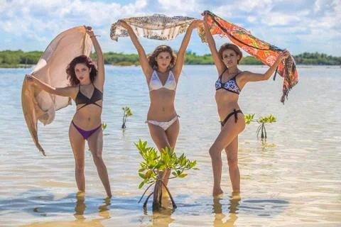 Hispanic Models At The Beach Stock Photos