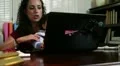 Hispanic mom working at her home office HD Footage